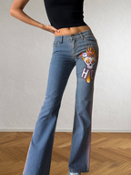 2000s flared jeans with hand-drawn designs