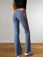 2000s flared jeans with hand-drawn designs