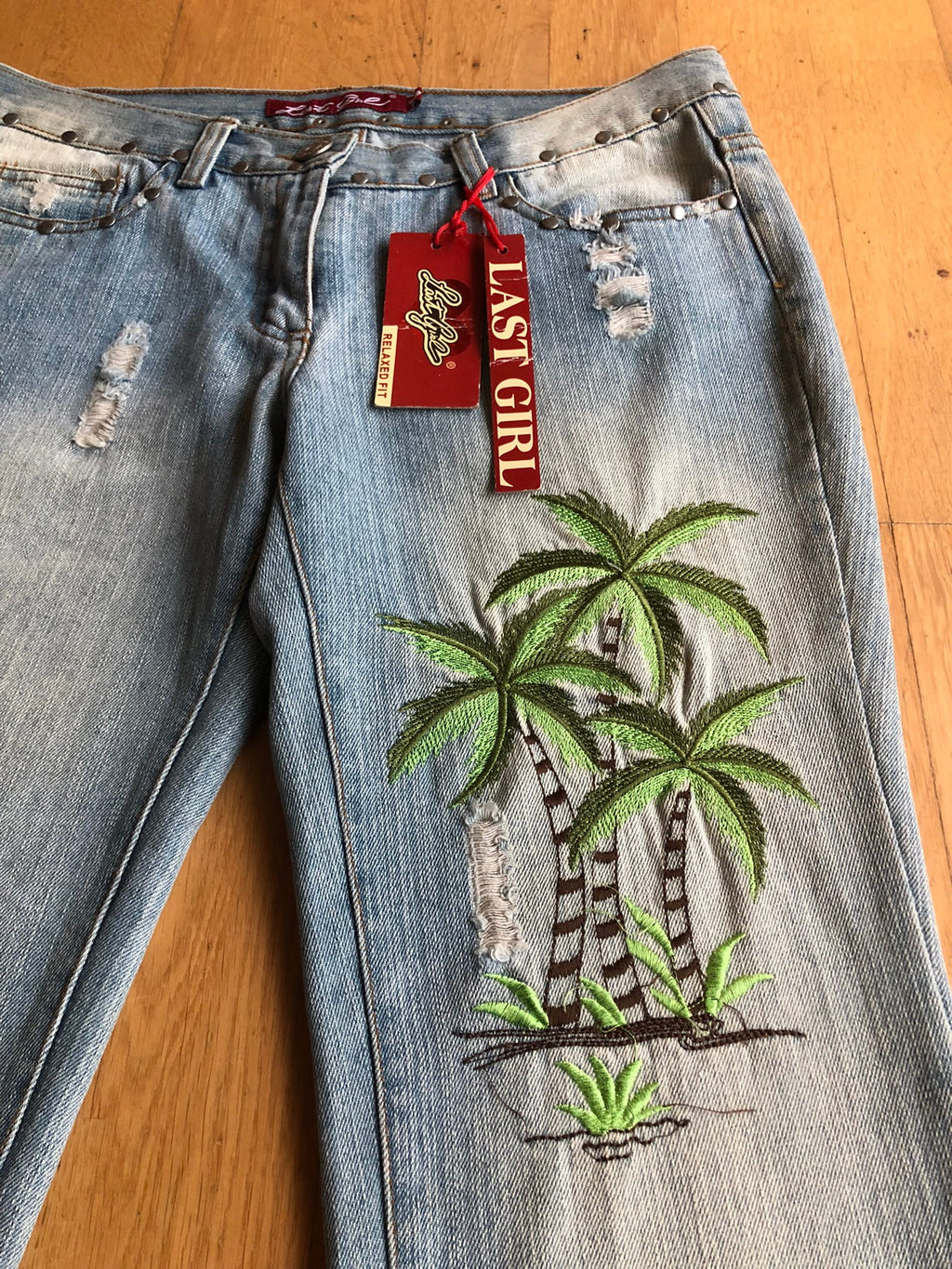 Low-rise bootcut embroidered flared jeans