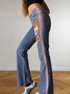 2000s flared jeans with hand-drawn designs