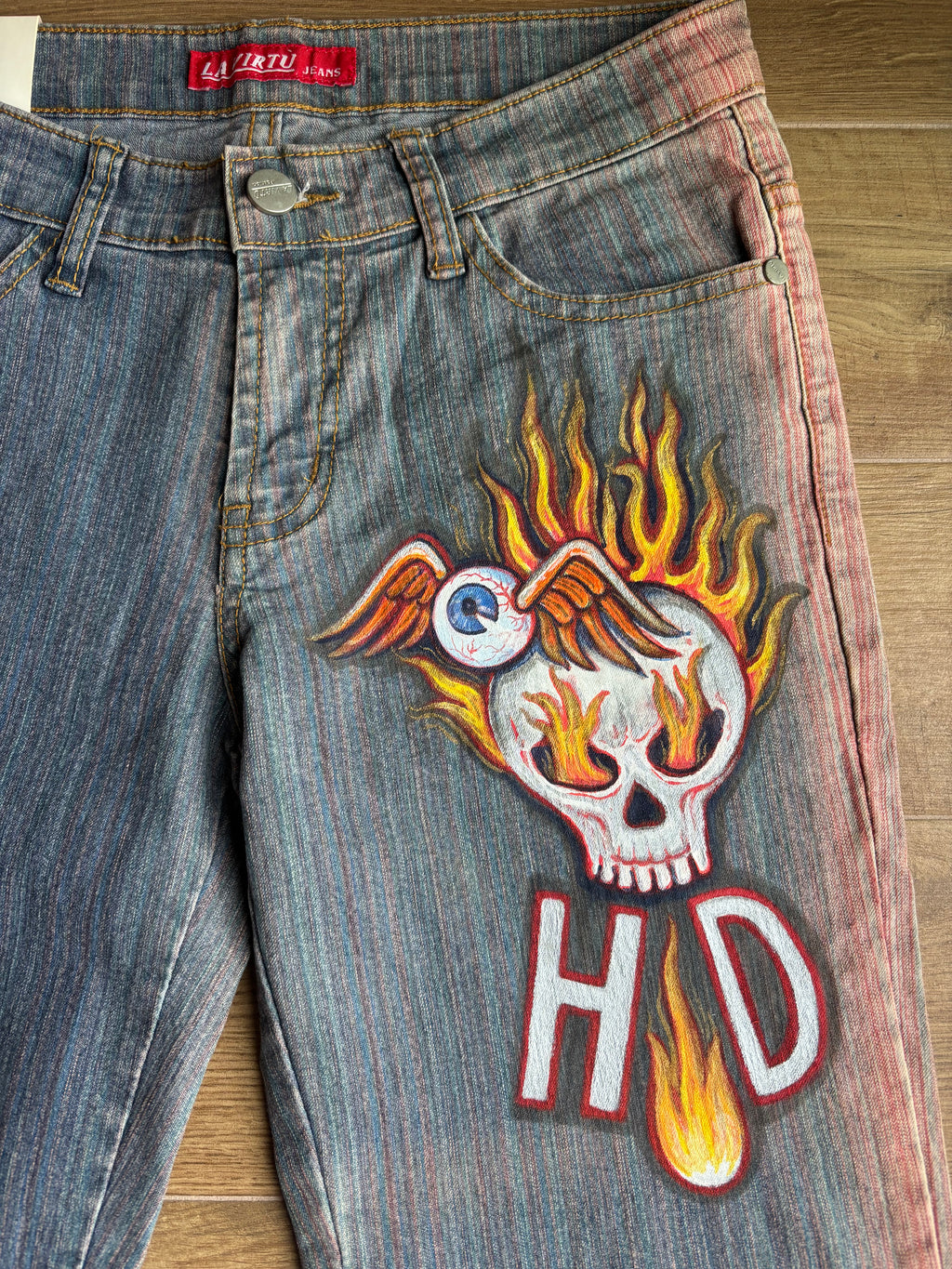 2000s flared jeans with hand-drawn designs