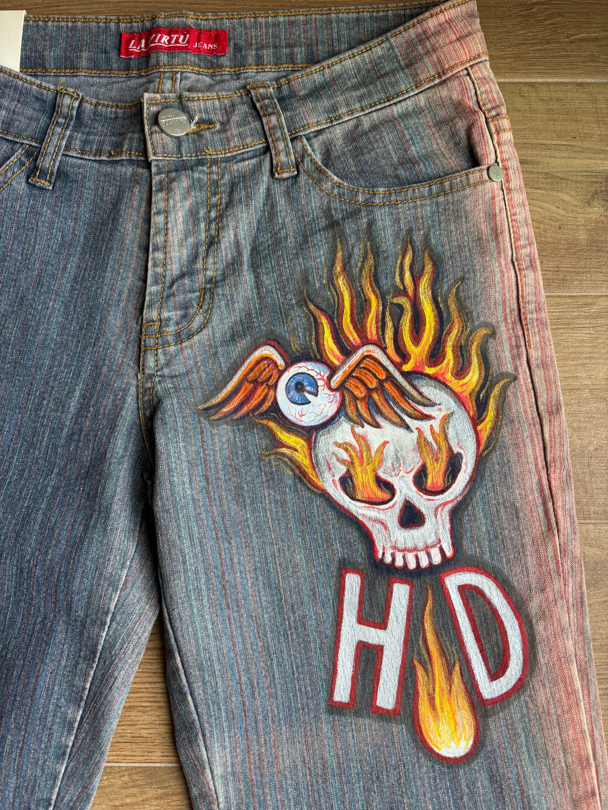 2000s flared jeans with hand-drawn designs