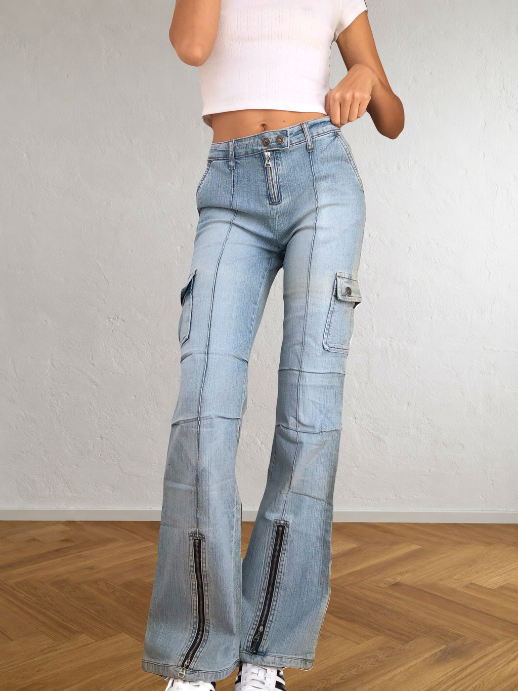 90s light-wash cargo jeans with zip cuffs