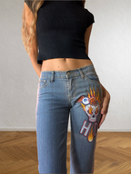 2000s flared jeans with hand-drawn designs