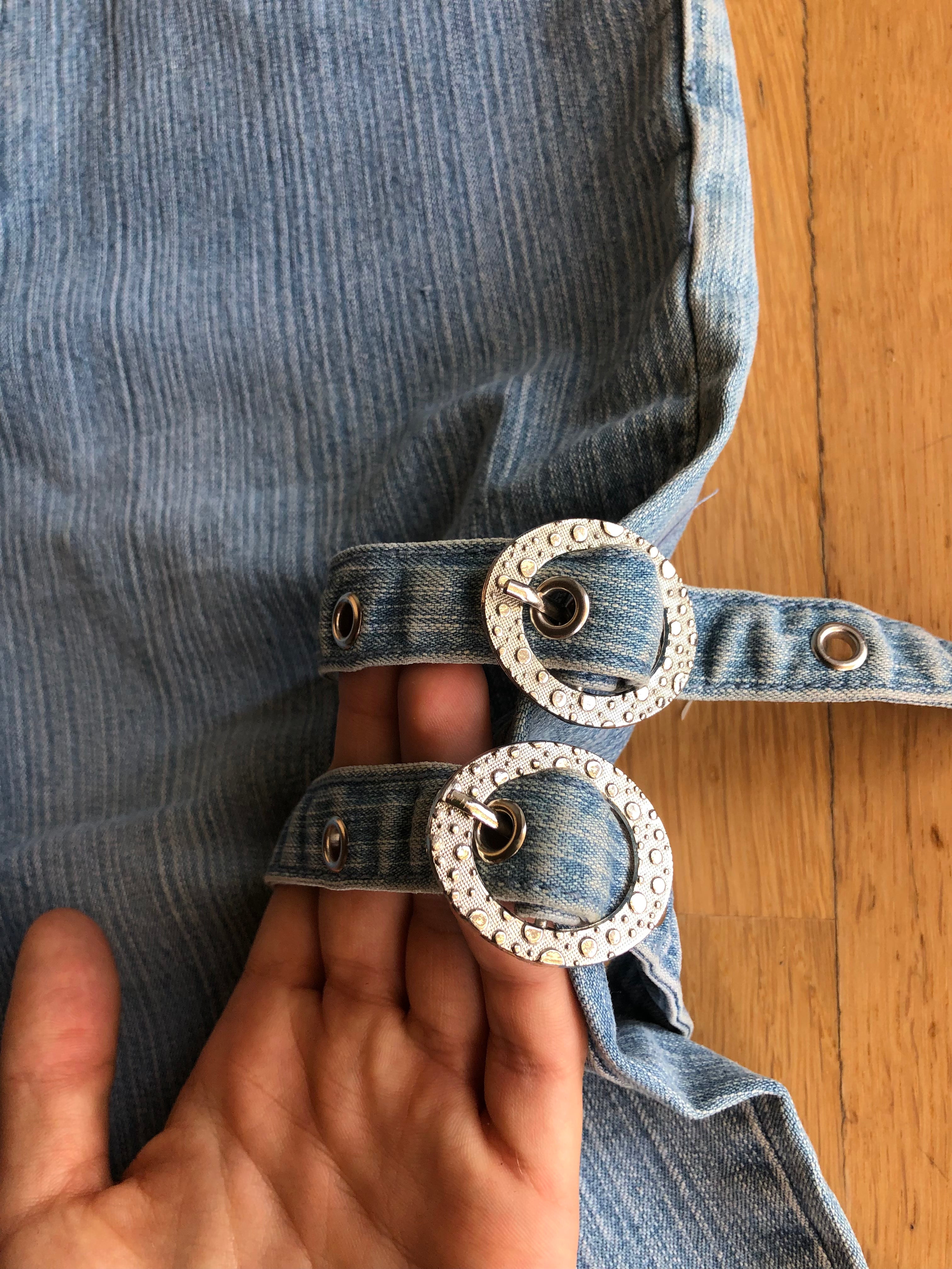2000s light blue Capri jeans with side buckles