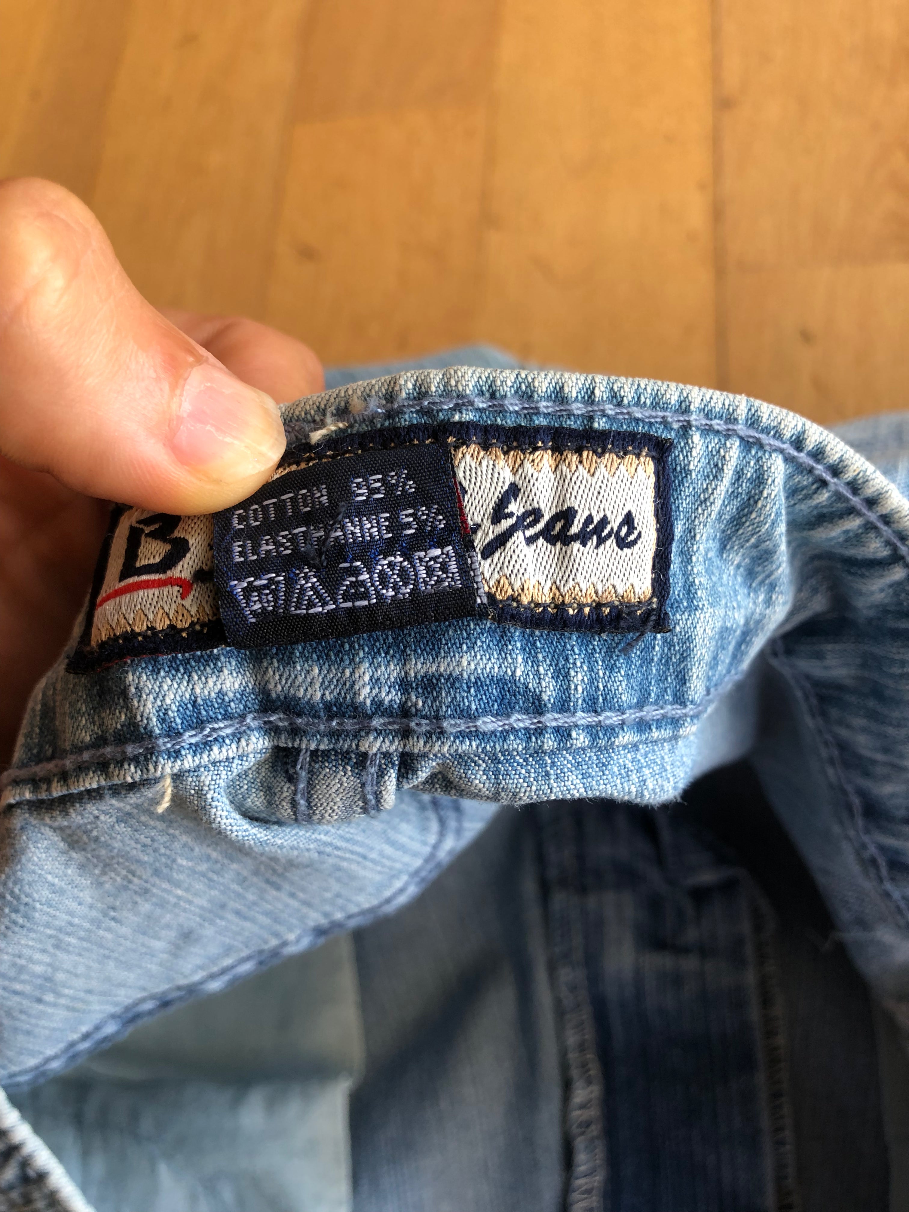 2000s light blue Capri jeans with side buckles