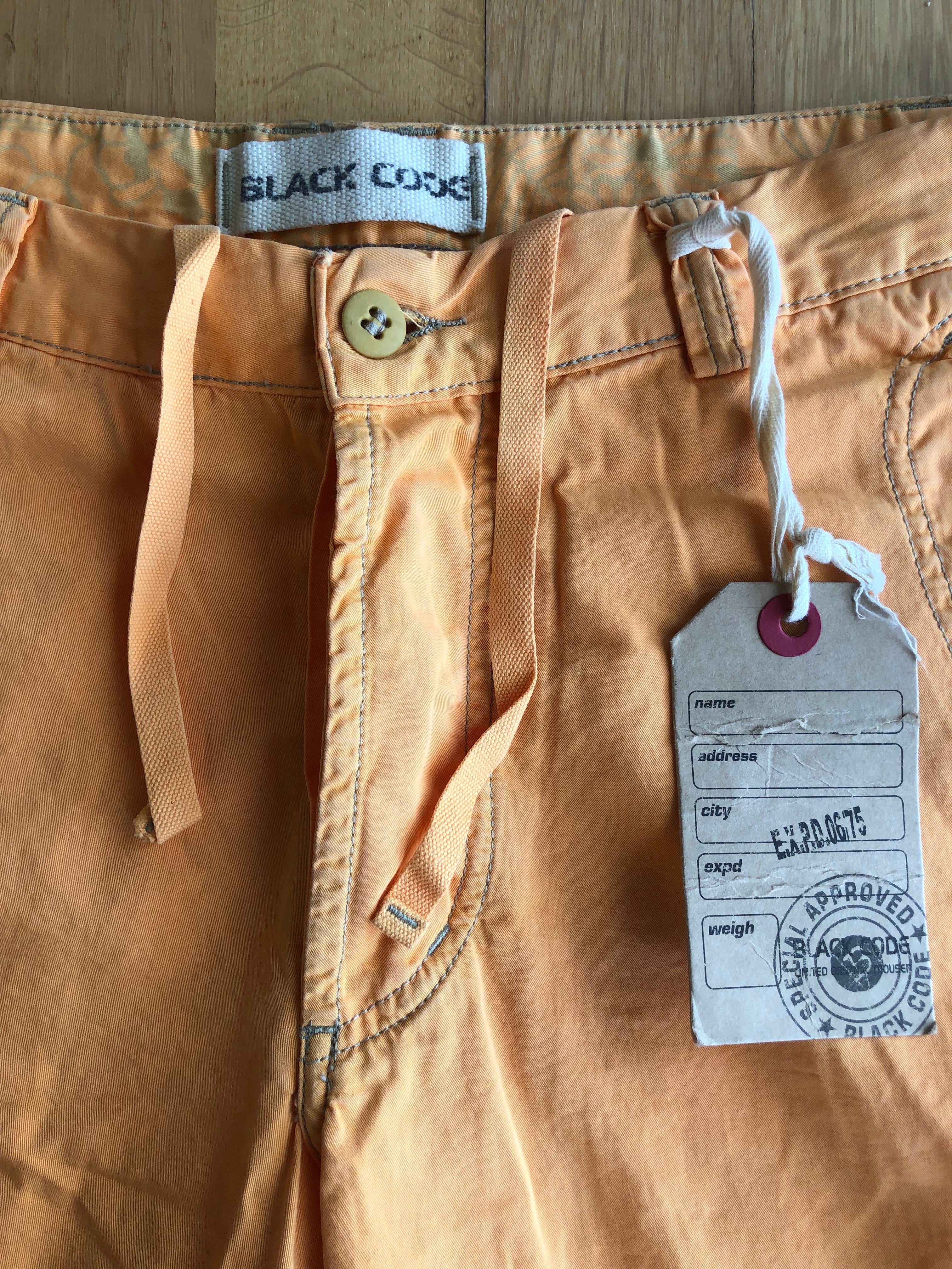 90s orange knee-length shorts