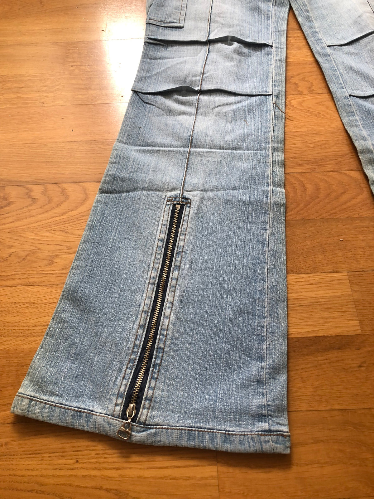 90s light-wash cargo jeans with zip cuffs