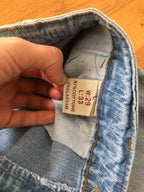90s light-wash cargo jeans with zip cuffs