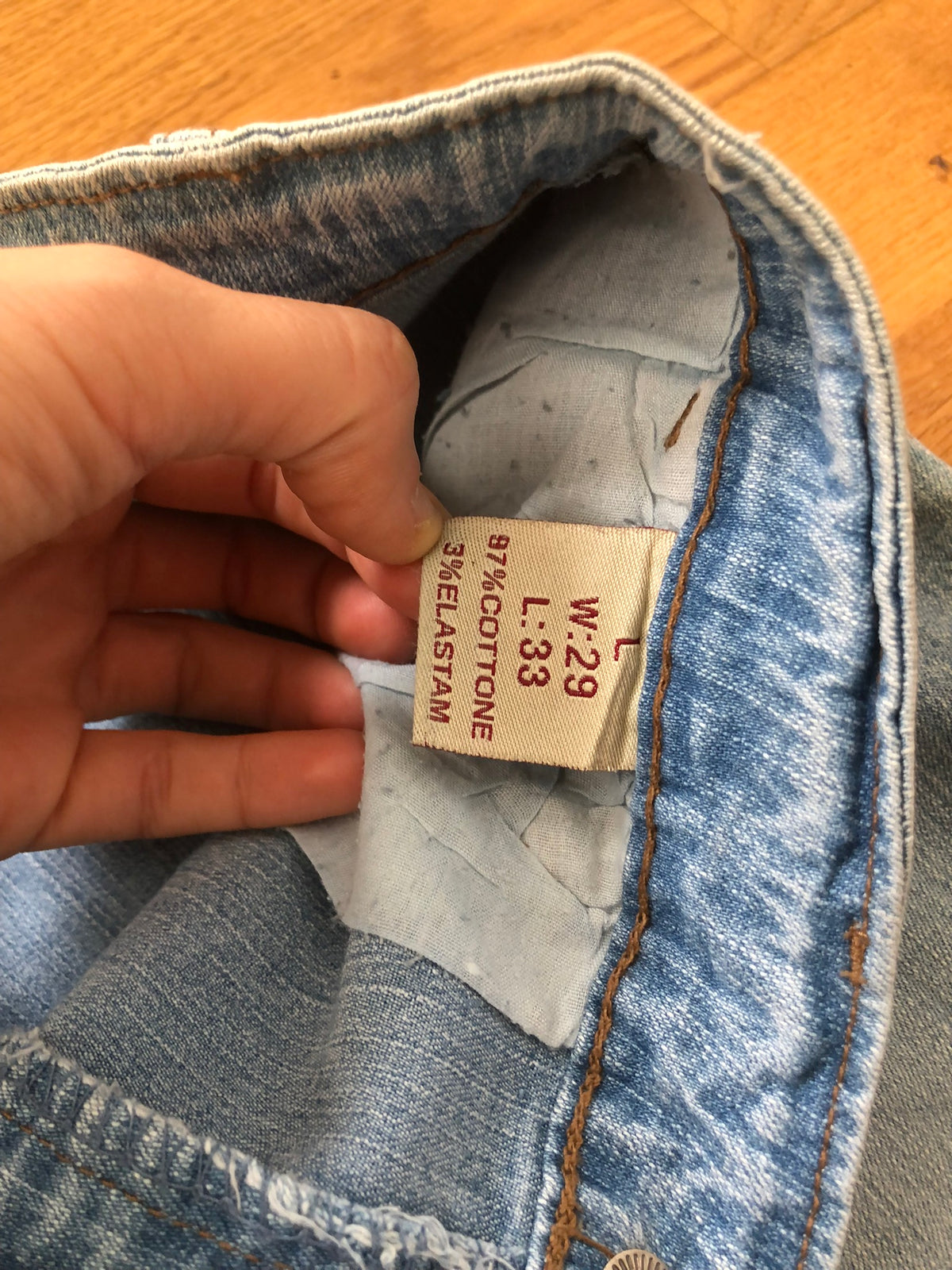 90s light-wash cargo jeans with zip cuffs