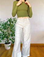 Beige wide-leg cargo pants with light-colored inserts
