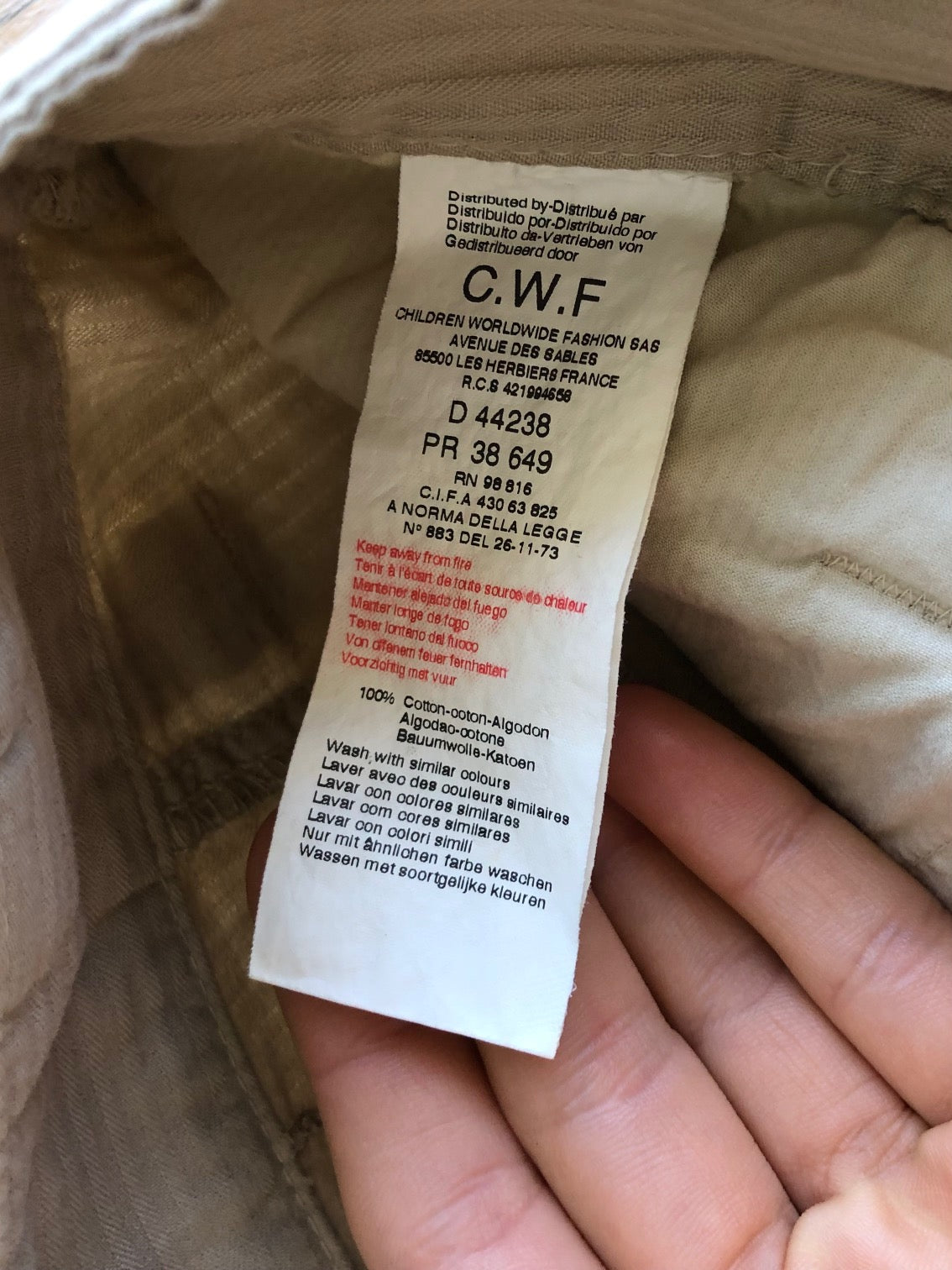 Beige wide-leg cargo pants with light-colored inserts