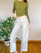 Beige wide-leg cargo pants with light-colored inserts