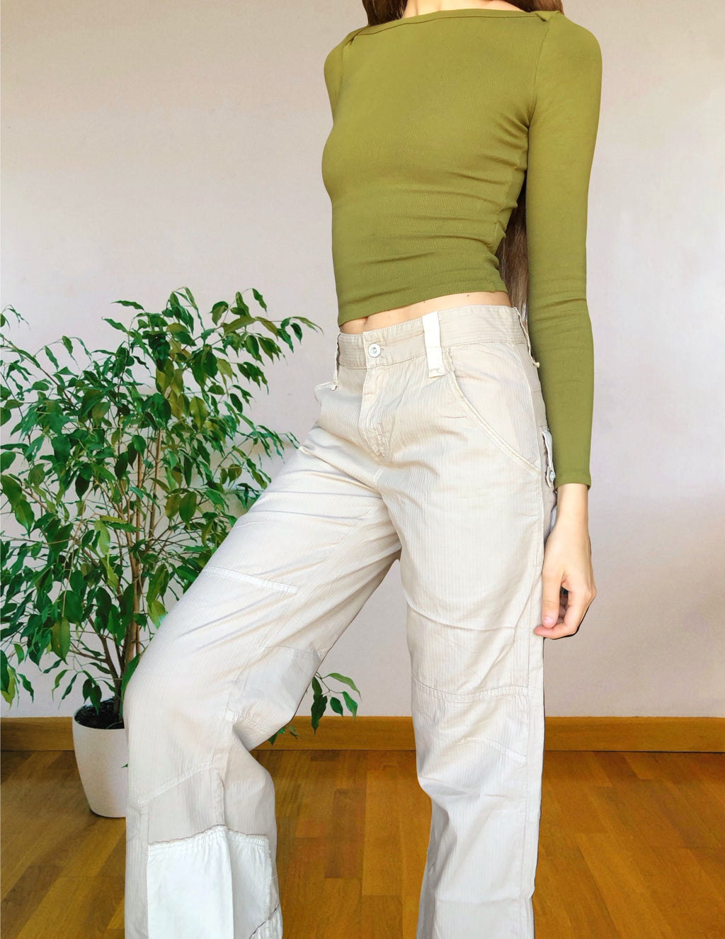 Beige wide-leg cargo pants with light-colored inserts