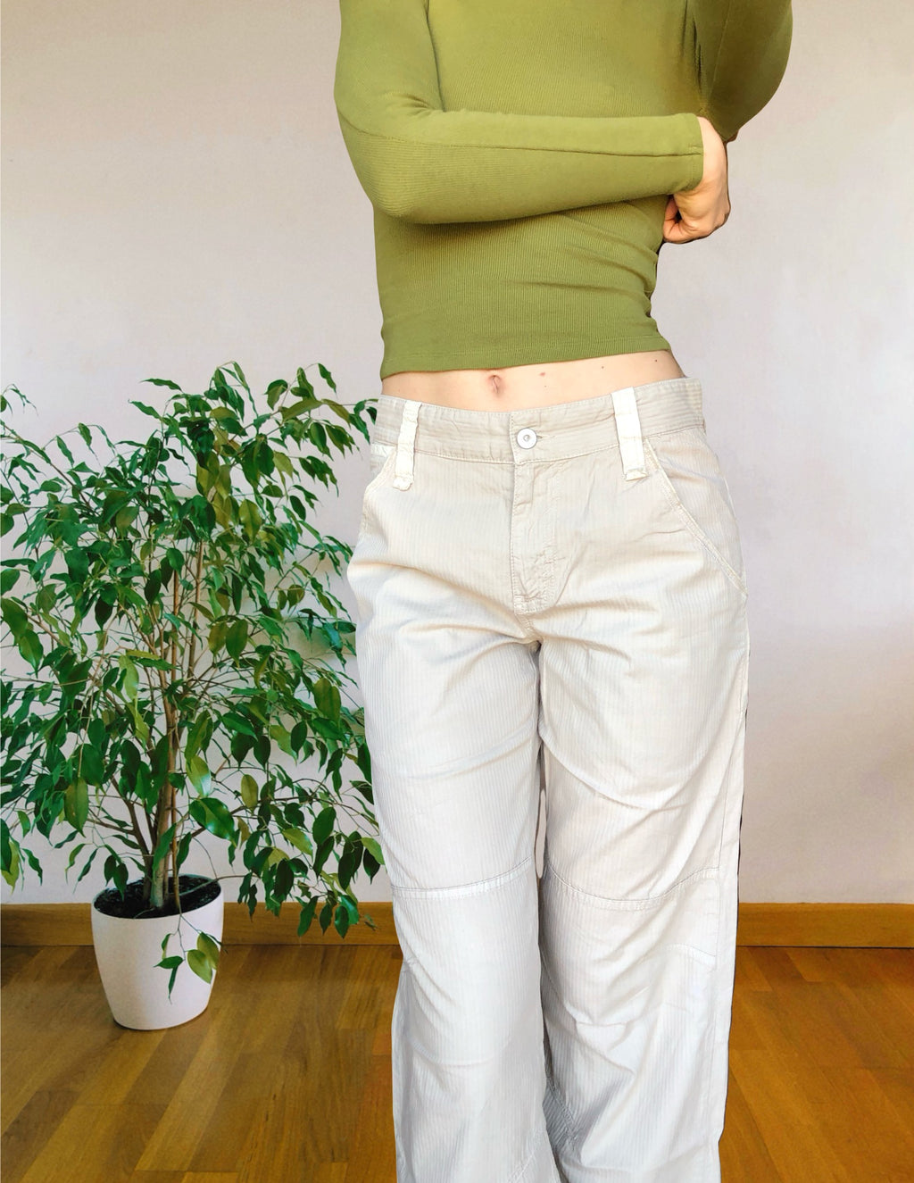 Beige wide-leg cargo pants with light-colored inserts