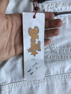 Pantaloni bianchi vintage anni 2000. Cargo, zip, cintura e fibbie