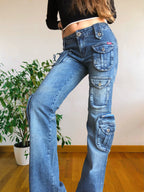 Jeans vintage anni 90 svasati. Molteplici tasche tonde