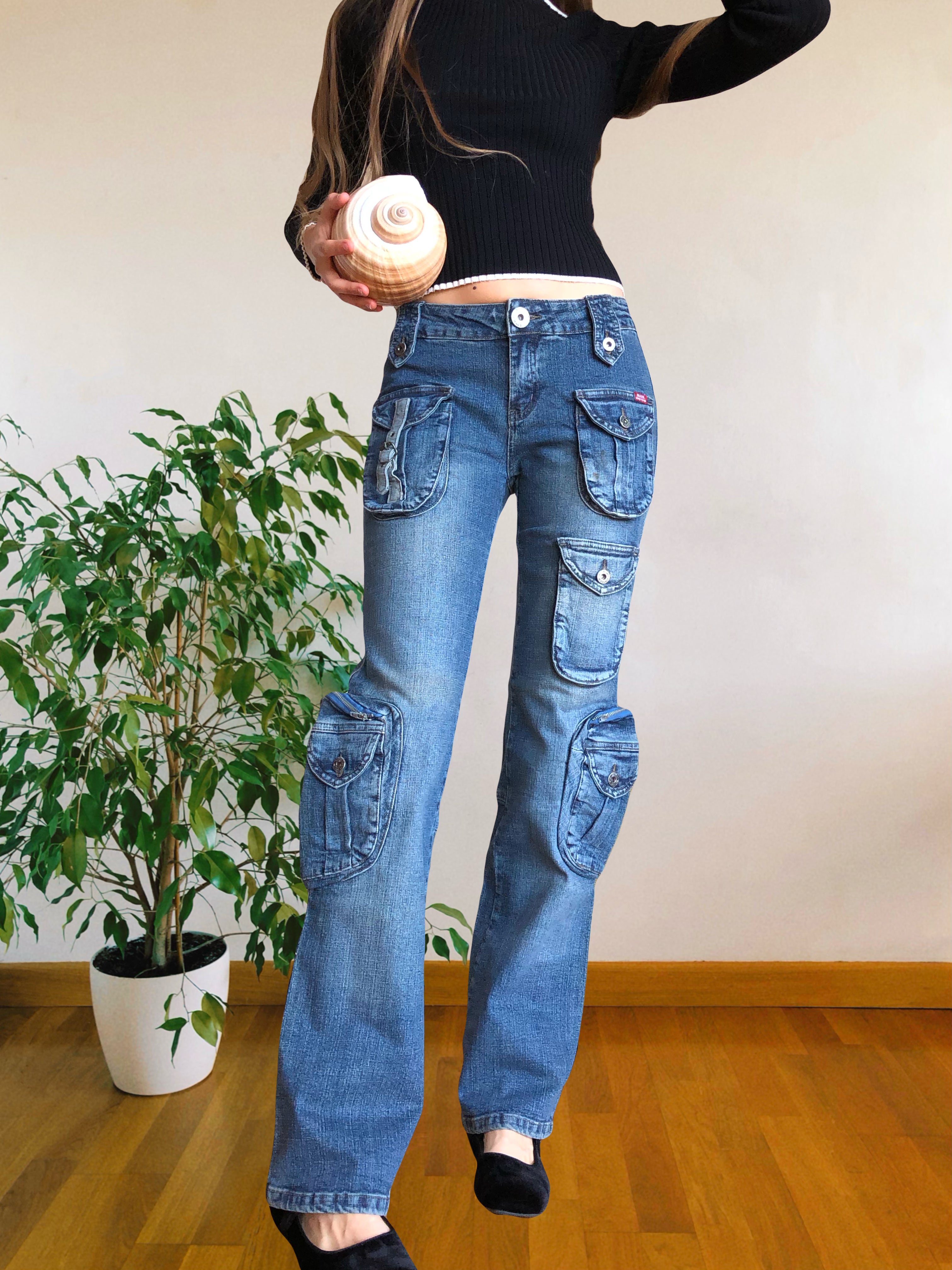 Jeans vintage anni 90 svasati. Molteplici tasche tonde