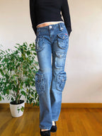Jeans vintage anni 90 svasati. Molteplici tasche tonde