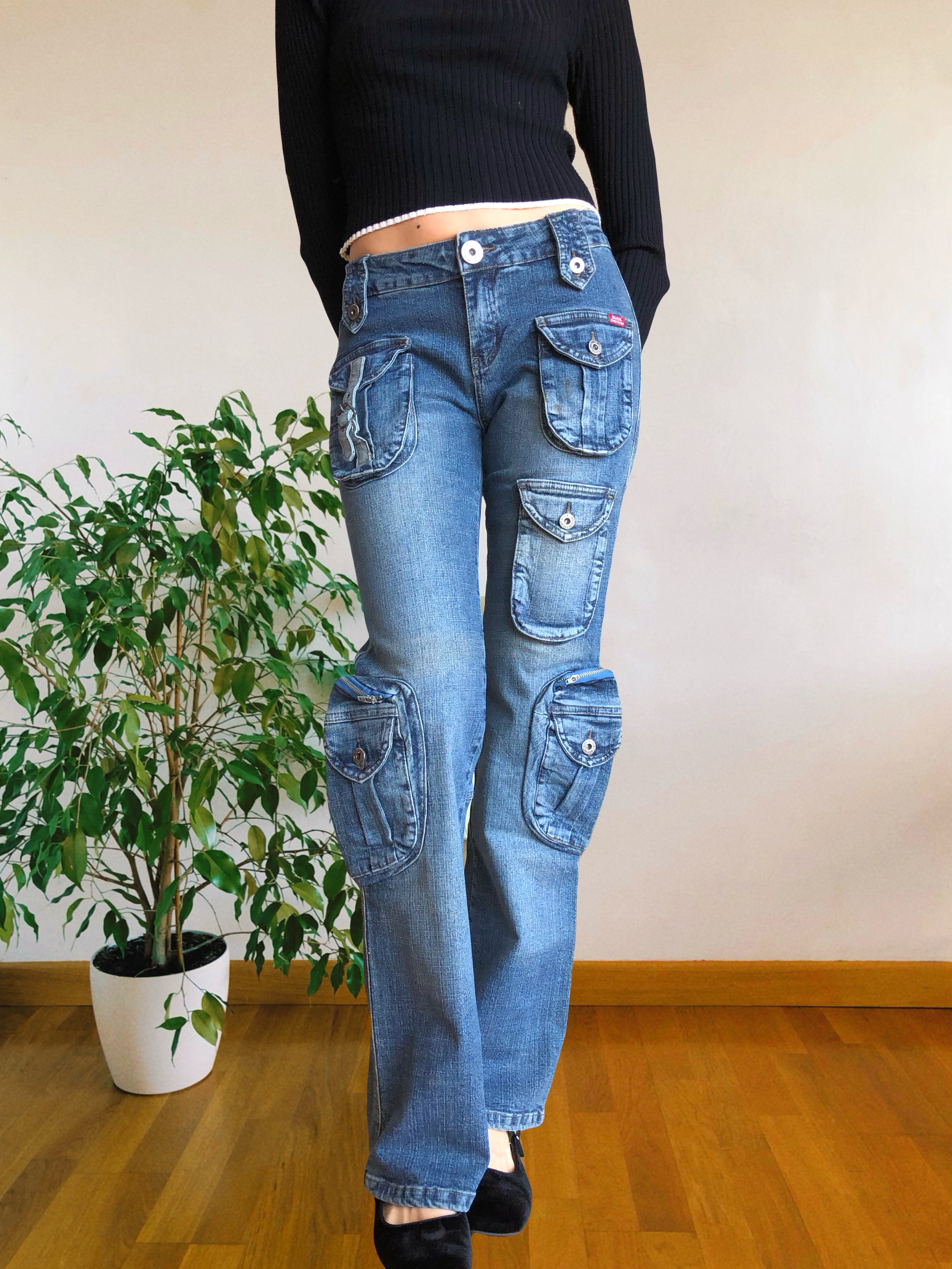 Jeans vintage anni 90 svasati. Molteplici tasche tonde