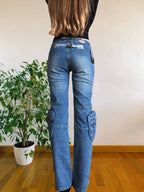 Jeans vintage anni 90 svasati. Molteplici tasche tonde