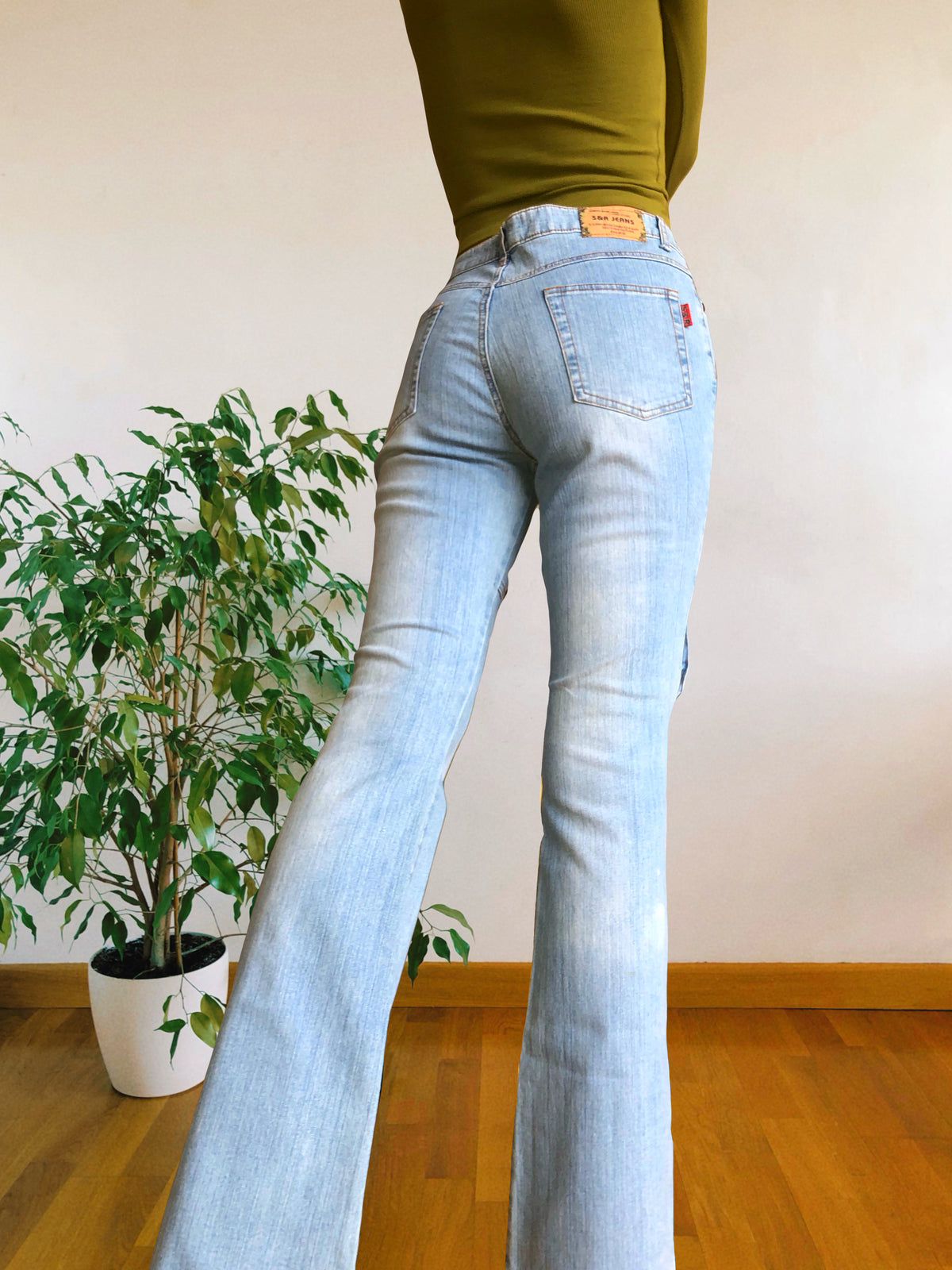Jean flare clair style années 90 avec poches et zip