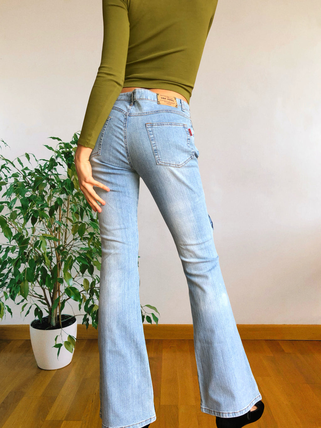 Jean flare clair style années 90 avec poches et zip