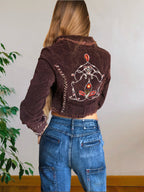 Cropped blazer with embroidery on the back