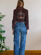 Cropped blazer with embroidery on the back