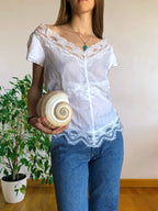 Blusa bianca scollo ampio ricamata