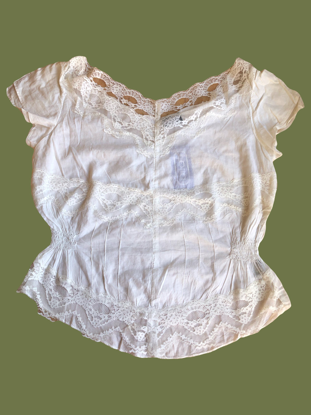 Blusa bianca scollo ampio ricamata