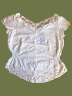 Blusa bianca scollo ampio ricamata