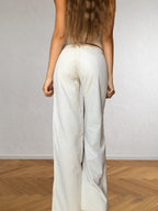 Pantaloni bianchi vintage anni 2000. Cargo, zip, cintura e fibbie