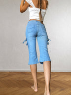 2000s light blue Capri jeans with side buckles