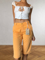 90s orange knee-length shorts