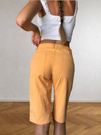 90s orange knee-length shorts