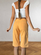90s orange knee-length shorts