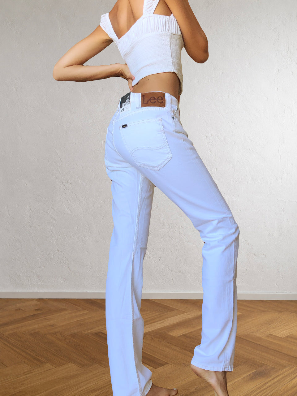 Jeans Bianchi LEE anni 90. A vita bassa svasati dritti