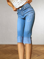 Jeans Capri con strass a forma di Scorpione