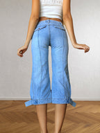 Weite Capri-Jeans mit Schnallen und niedriger Taille im 2000er-Jahre-Stil