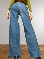Jeans anni 2000 a palazzo con bande laterali verdi
