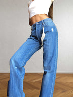 Jeans anni 90 a palazzo. Dettaglio con Toro