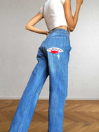 Jeans anni 90 a palazzo. Dettaglio con Toro