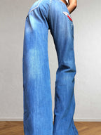 Jeans anni 90 a palazzo. Dettaglio con Toro